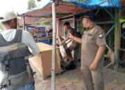 Trantib Bongkar Bangunan Liar Jembatan Ampera